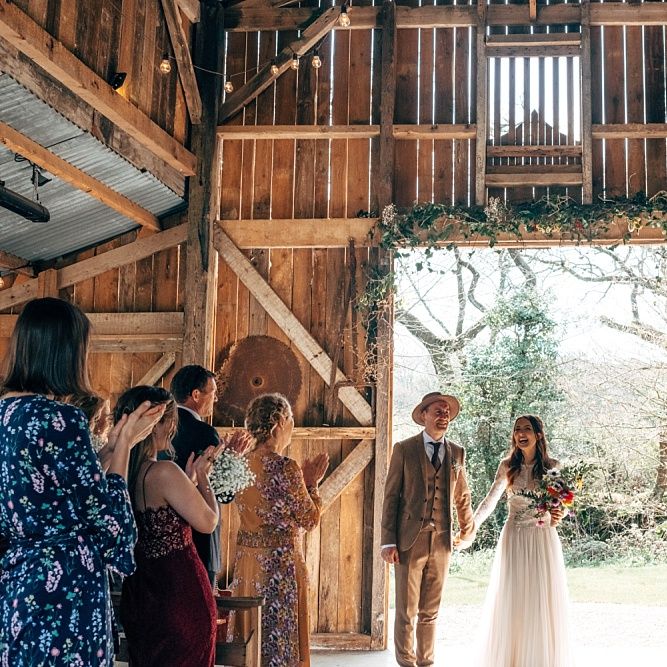 Nancarrow Farm Cornwall Wedding With Images From Dale Weeks &amp; Bride In Maggie Sottero With Wild Flower Bouquet &amp; Hand Knitted Flower Girl Outfit