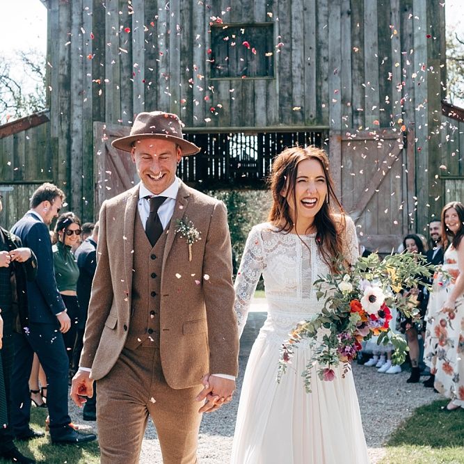 Just Married // Rusty Barn Wedding Ceremony Space At Nancarrow Farm // Nancarrow Farm Cornwall Wedding With Images From Dale Weeks &amp; Bride In Maggie Sottero With Wild Flower Bouquet &amp; Hand Knitted Flower Girl Outfit