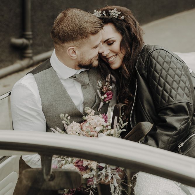 Bride and Groom in VW Beetle Wedding Car