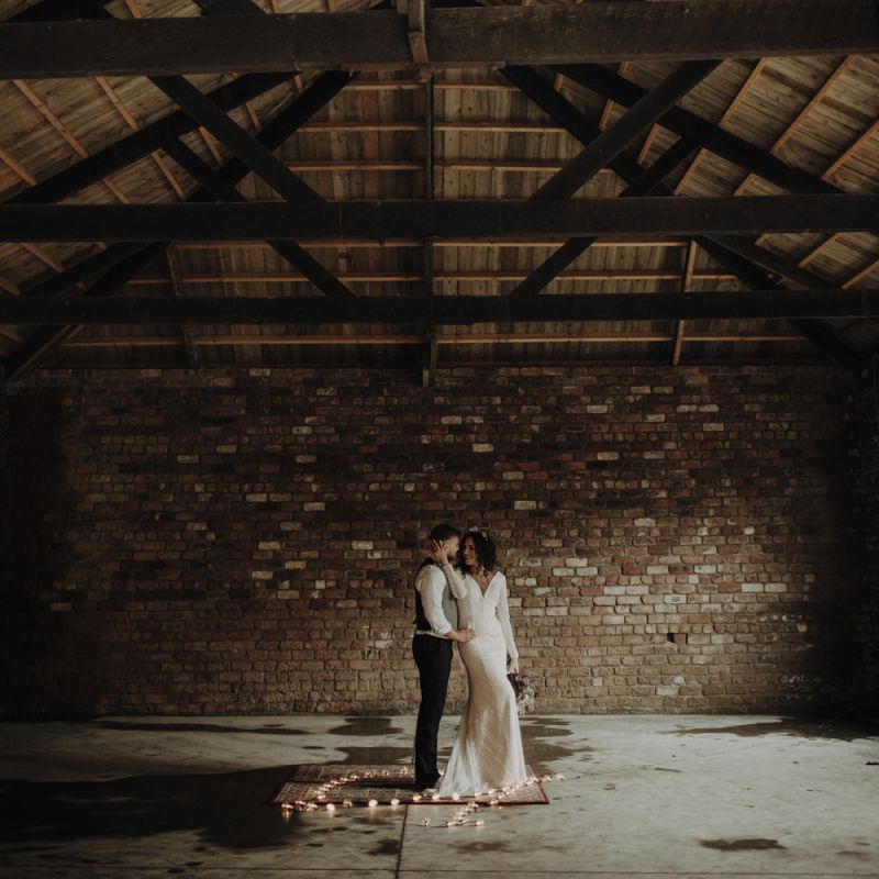 Boho Bride and Groom Standing in The Engine Works Glasgow Wedding Venue