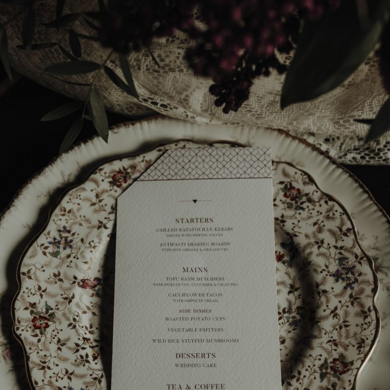Place Setting with Floral Tableware by The Green Cockatoo
