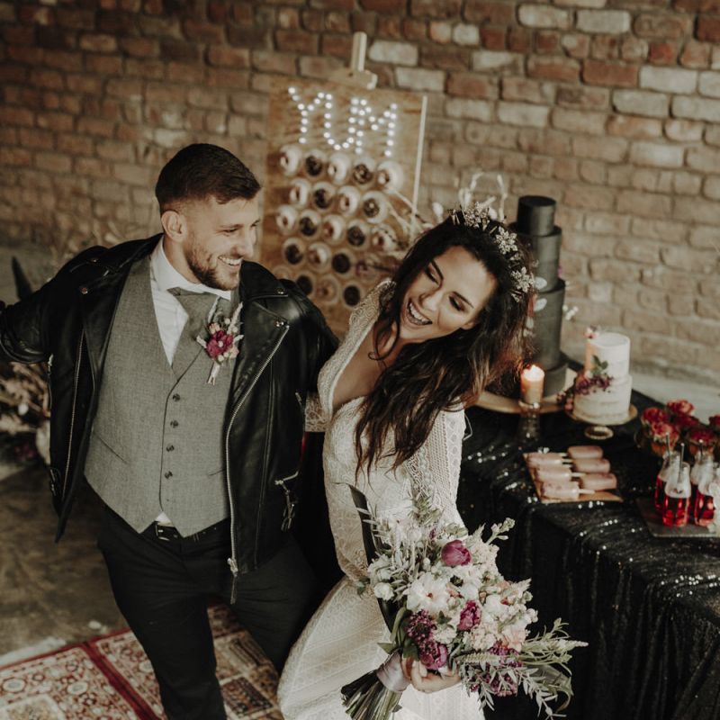 Boho Bride and Groom Dancing on Persian Rugs