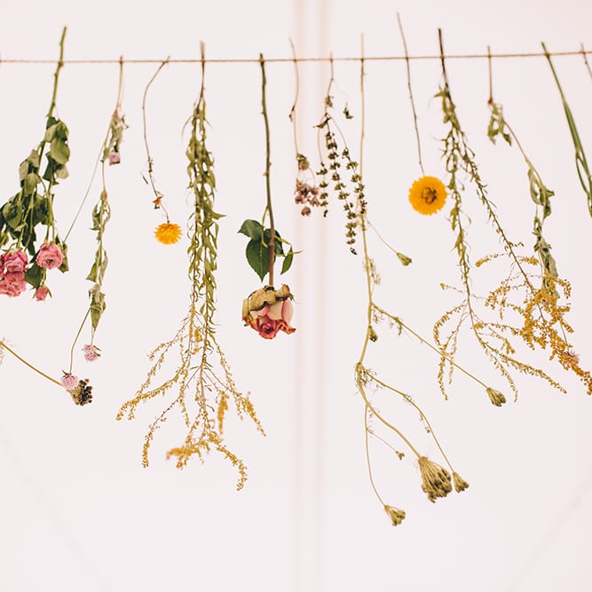 Hanging Flower Stems Wedding Decor | Blush Outdoor Destination Wedding at Chateau de Séréville, France  |  Story + Colour Photography