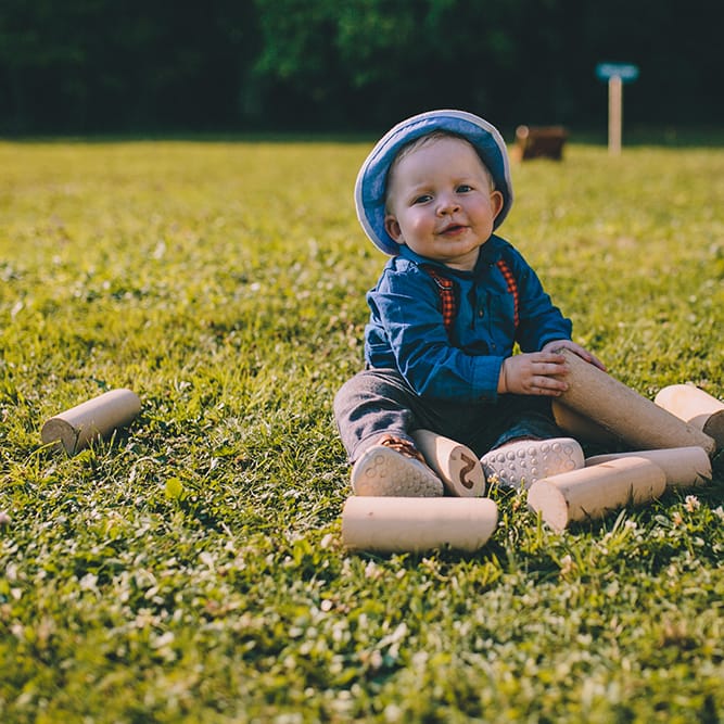 Baby Playing Garden Games | Blush Outdoor Destination Wedding at Chateau de Séréville, France  |  Story + Colour Photography