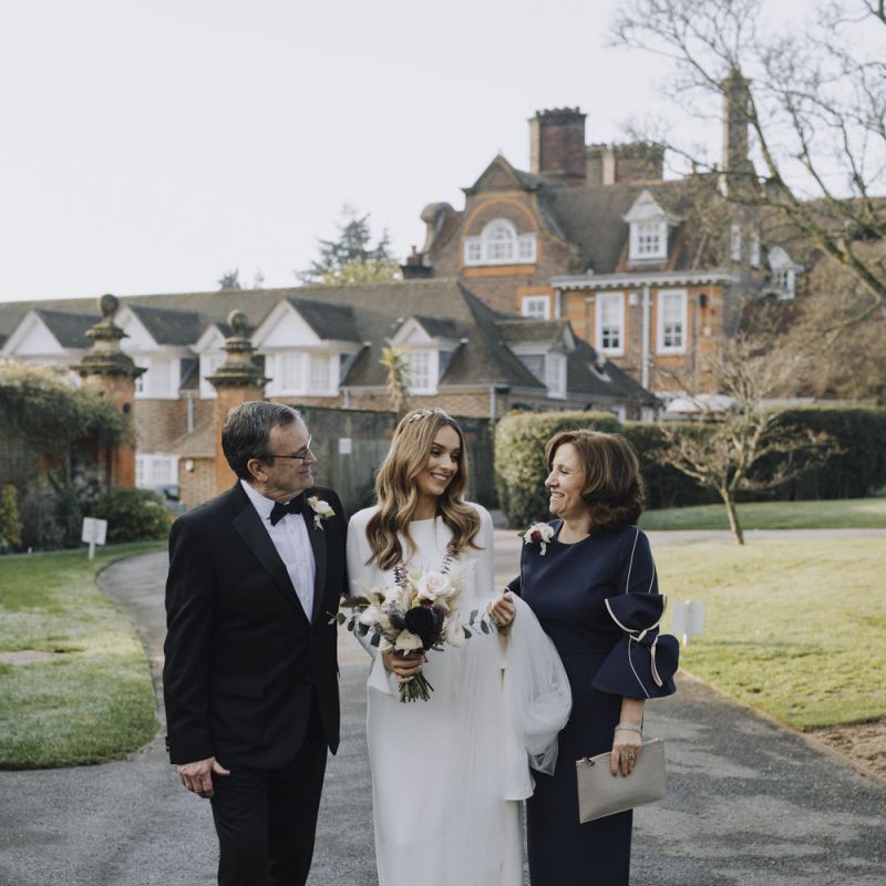Father and Mother of the Bride with Their Daughter