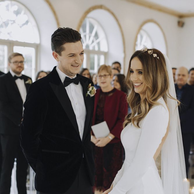 Wedding Ceremony with Bride and Groom Exchanging Vows