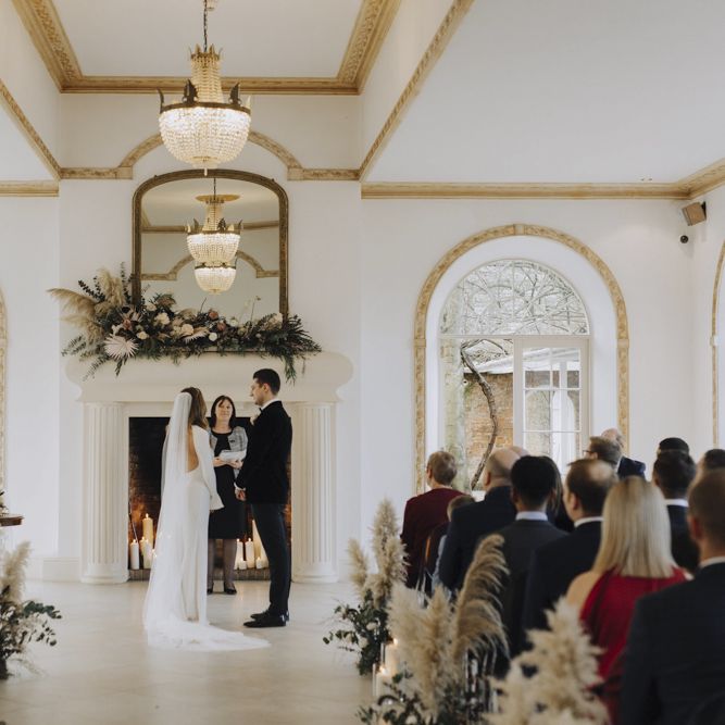 Wedding Ceremony at north brook Park with Pampas Grass Aisle Flowers