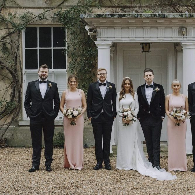 Wedding Party Portrait with Bride in Emma Beaumont Dress, Bridesmaids in Pink Dresses and Groomsmen in Tuxedos