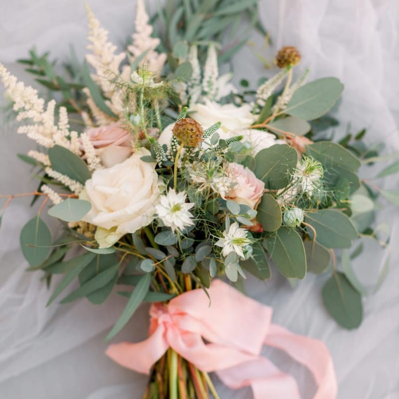 Beautiful bouquet for bride with pink ribbon