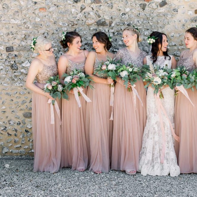 Pink bridesmaid dresses for Lulworth Castle wedding