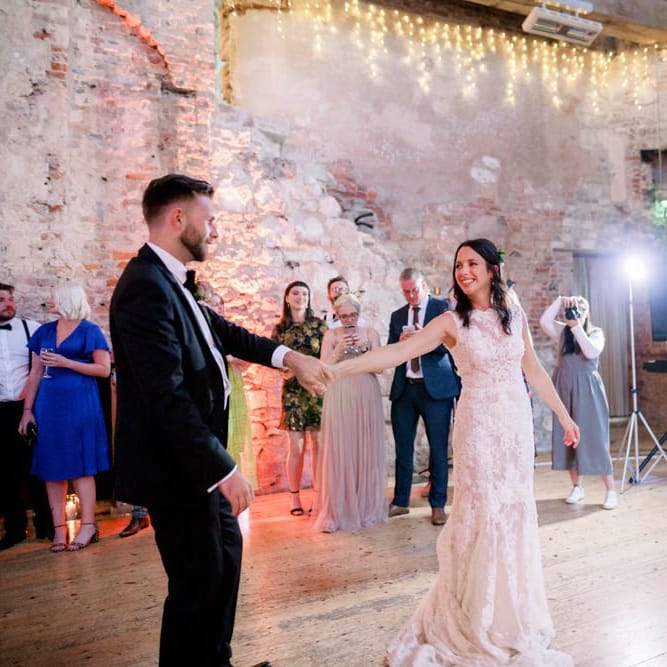 Bride and groom first dance at Lulworth Castle