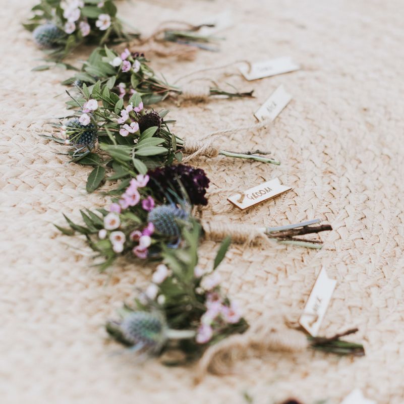 Wildflower buttonholes for groomsmen at sustainable wedding
