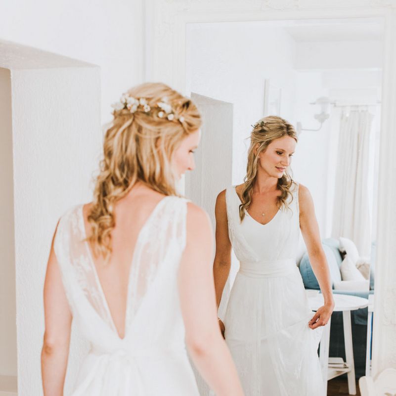 Bride wears second-hand wedding dress by Charlie Brear