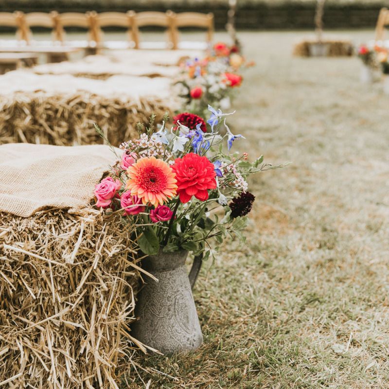 Wildflowers line the aisle at vegan wedding