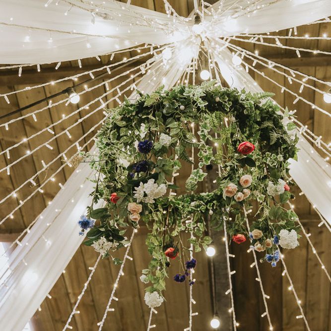 Beautiful wedding decor with foliage and flower chandelier