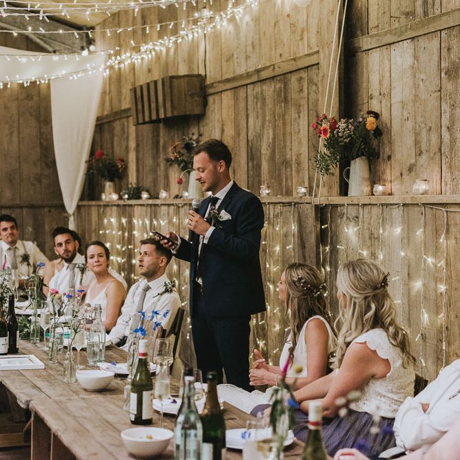 Wedding speeches with fairy light backdrop