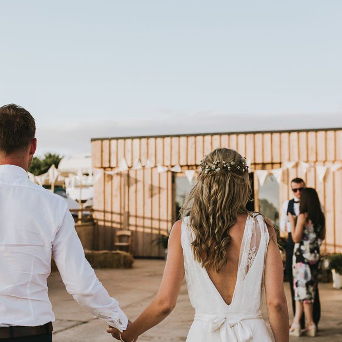 Bridal half up half down hair style with flowers