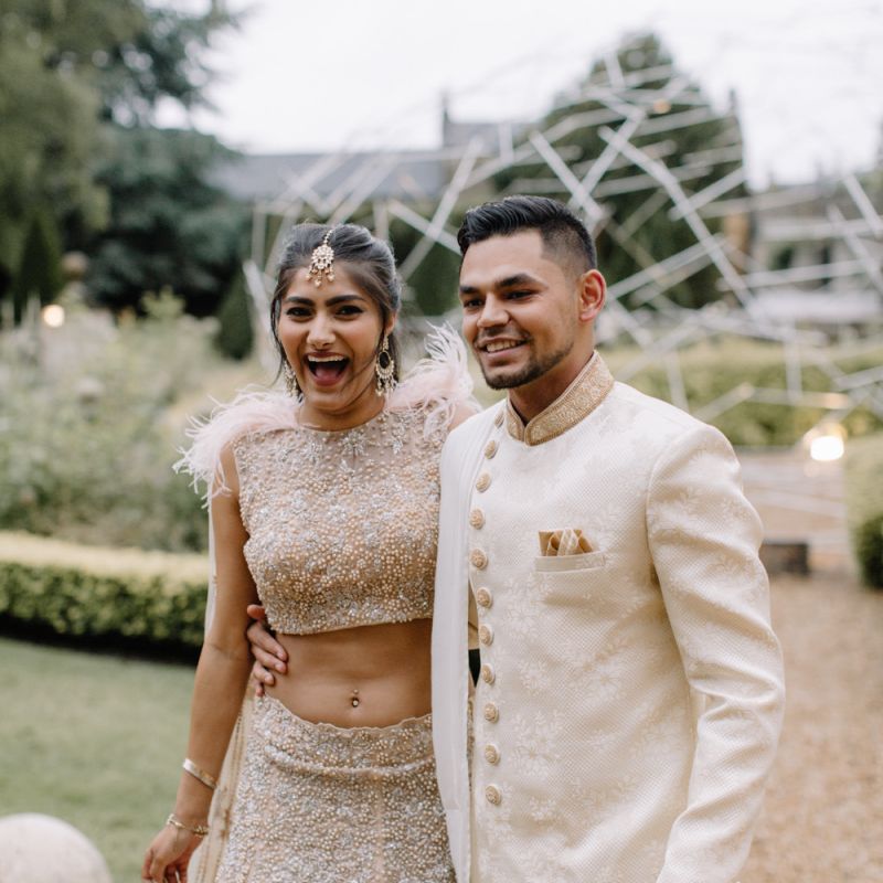 Bride and groom in traditional Indian wedding attire