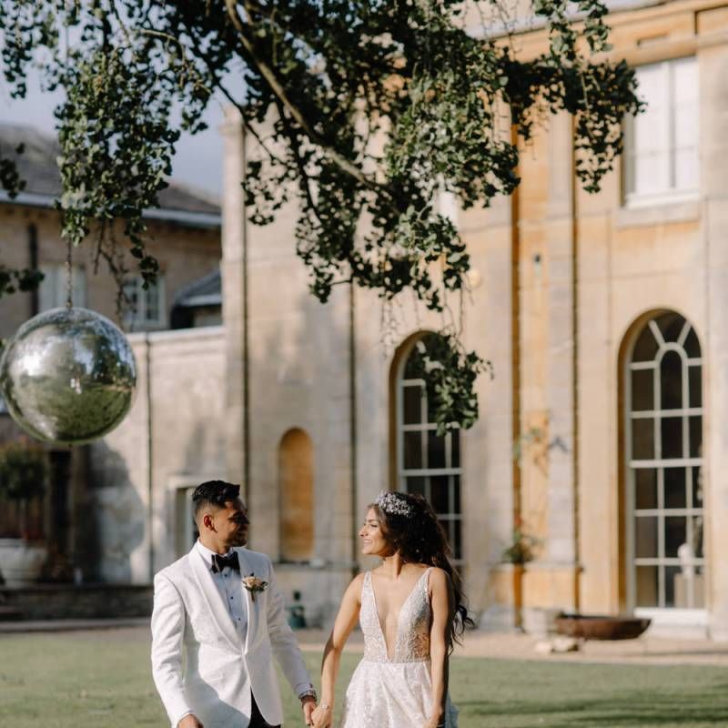 Bride and groom portrait by Rebecca Goddard Photography with bride in Berta Bridal wedding dress