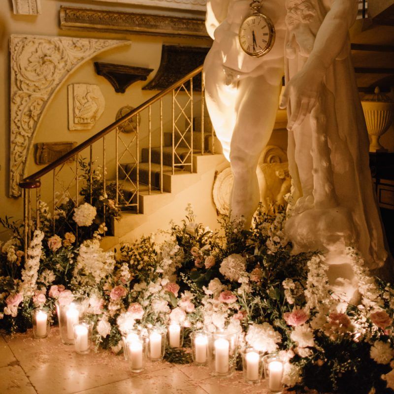 Romantic candle light decorating Aynhoe Park wedding