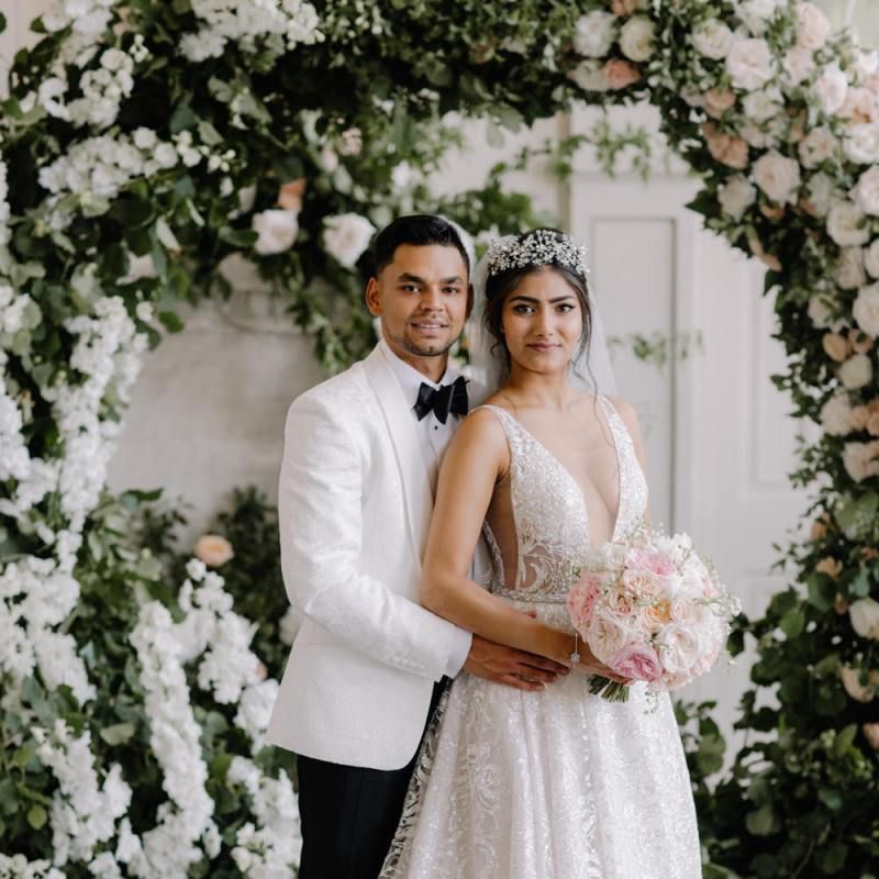 Bride and groom portrait at Aynhoe Park with bride in Berta Bridal wedding dress