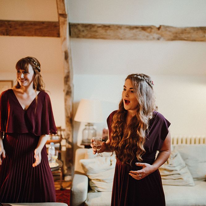 Bridesmaids in Mismatched Maroon Dresses from High Street | Mariachi Band and Persian Rug Aisle for Autumn Wedding | Leah Lombardi Weddings