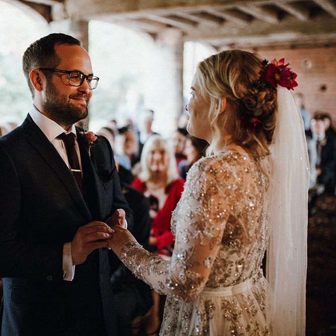 Bride in Bead Embellished Needle &amp; Thread Gown with Cascading Tulle Skirt and Semi Sheer Sleeves | Elbow Length Veil | Bridal Up Do with Pink Hair Flowers | Groom in Check Blue Three Piece Suit by T.M.Lewin with Maroon Tie and Pocket Square | Wedding Ceremony at Pimhill Barn | Mariachi Band and Persian Rug Aisle for Autumn Wedding | Leah Lombardi Weddings