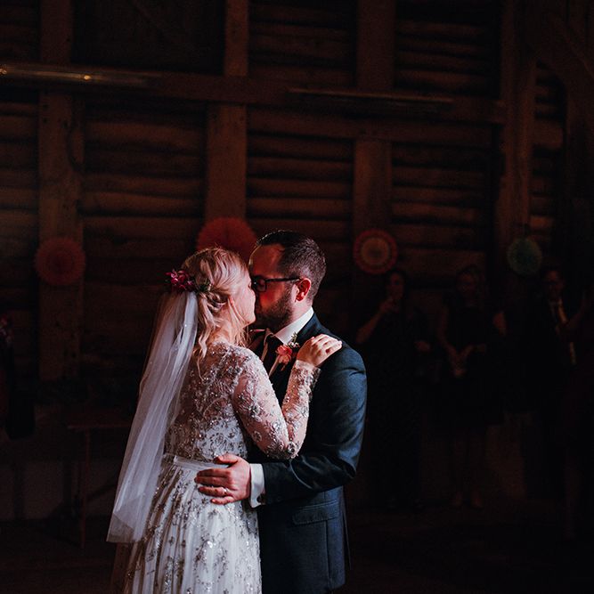 Bride in Bead Embellished Needle &amp; Thread Gown with Cascading Tulle Skirt and Semi Sheer Sleeves | Elbow Length Veil | Bridal Up Do with Pink Hair Flowers | Groom in Check Blue Three Piece Suit by T.M.Lewin with Maroon Tie and Pocket Square | First Dance | Paper Fans | Mariachi Band and Persian Rug Aisle for Autumn Wedding | Leah Lombardi Weddings
