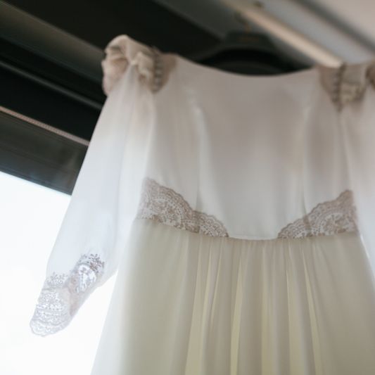 Stylish Wedding Dress with beautiful Back Detail from Beba’s Closet, for a Destination Wedding at Castillo de Viñuelas in Madrid, Spain | Lorena San José Photography