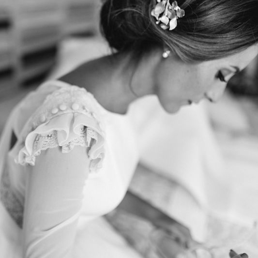 Stylish Wedding Dress with beautiful Back Detail from Beba’s Closet, for a Destination Wedding at Castillo de Viñuelas in Madrid, Spain | Lorena San José Photography