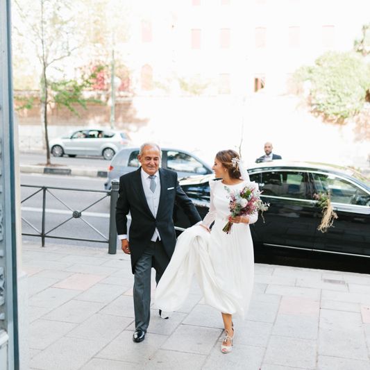 Stylish Wedding Dress with beautiful Back Detail from Beba’s Closet, for a Destination Wedding at Castillo de Viñuelas in Madrid, Spain | Lorena San José Photography