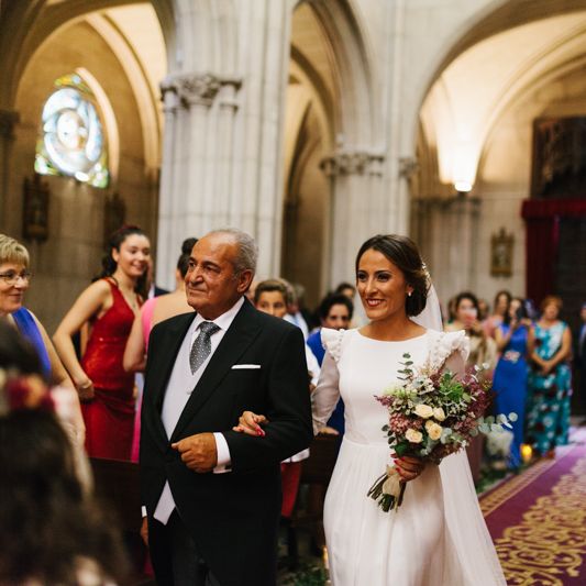 Stylish Wedding Dress with beautiful Back Detail from Beba’s Closet, for a Destination Wedding at Castillo de Viñuelas in Madrid, Spain | Lorena San José Photography