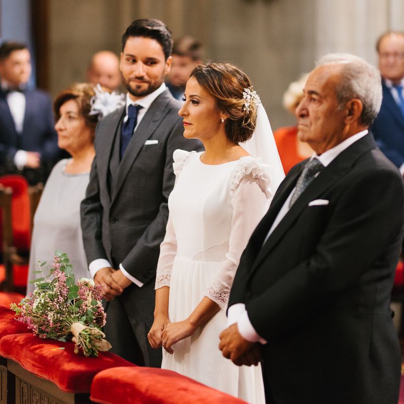 Stylish Wedding Dress with beautiful Back Detail from Beba’s Closet, for a Destination Wedding at Castillo de Viñuelas in Madrid, Spain | Lorena San José Photography