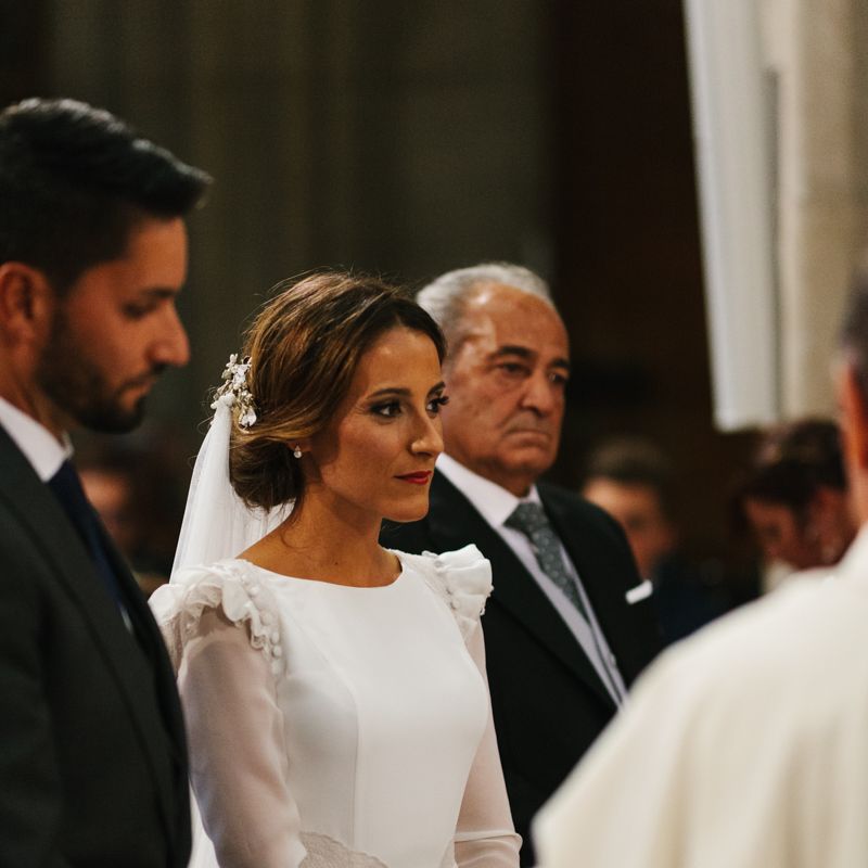 Stylish Wedding Dress with beautiful Back Detail from Beba’s Closet, for a Destination Wedding at Castillo de Viñuelas in Madrid, Spain | Lorena San José Photography