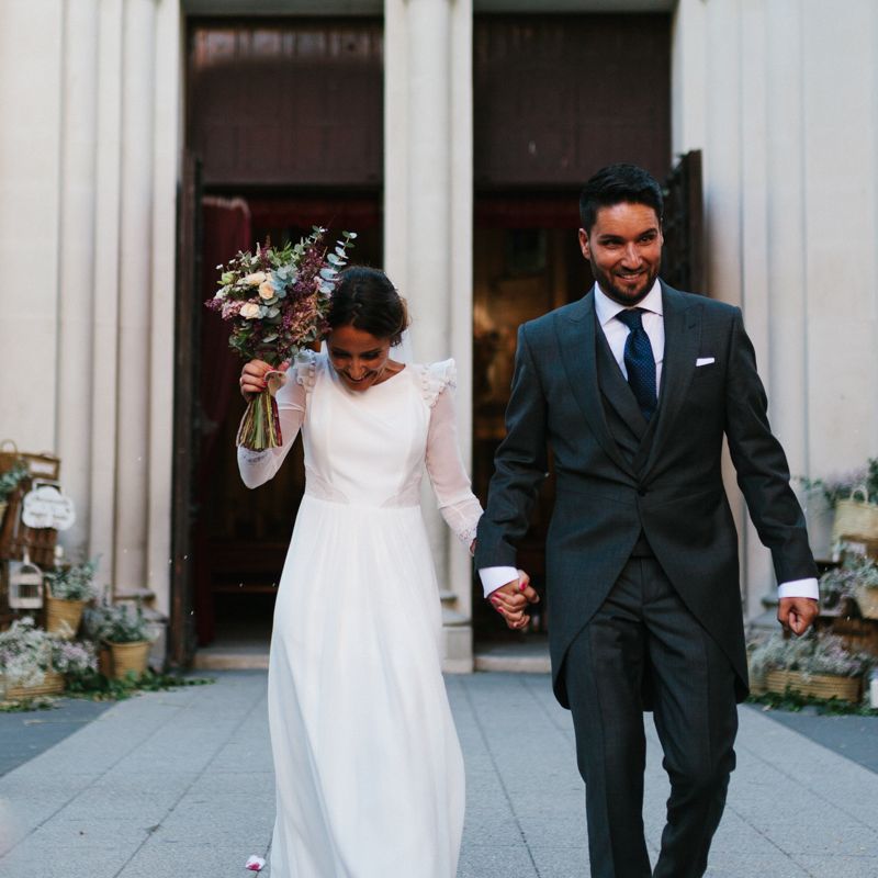 Stylish Wedding Dress with beautiful Back Detail from Beba’s Closet, for a Destination Wedding at Castillo de Viñuelas in Madrid, Spain | Lorena San José Photography
