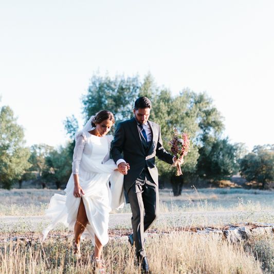 Stylish Wedding Dress with beautiful Back Detail from Beba’s Closet, for a Destination Wedding at Castillo de Viñuelas in Madrid, Spain | Lorena San José Photography