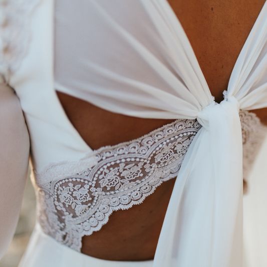 Stylish Wedding Dress with beautiful Back Detail from Beba’s Closet, for a Destination Wedding at Castillo de Viñuelas in Madrid, Spain | Lorena San José Photography