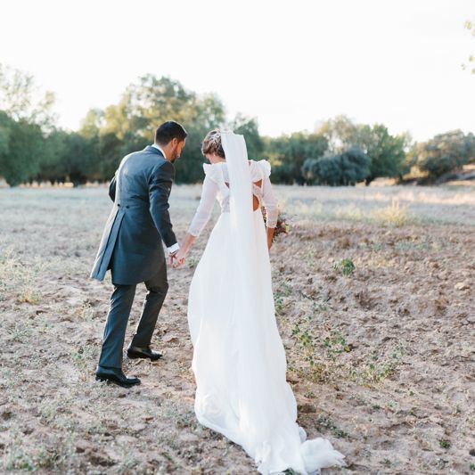 Stylish Wedding Dress with beautiful Back Detail from Beba’s Closet, for a Destination Wedding at Castillo de Viñuelas in Madrid, Spain | Lorena San José Photography