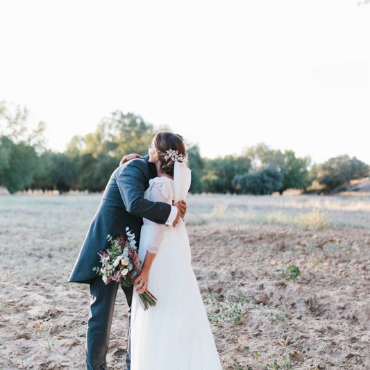 Stylish Wedding Dress with beautiful Back Detail from Beba’s Closet, for a Destination Wedding at Castillo de Viñuelas in Madrid, Spain | Lorena San José Photography