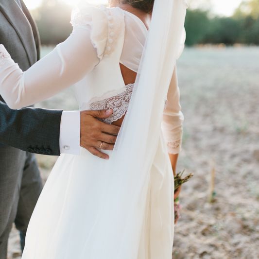 Stylish Wedding Dress with beautiful Back Detail from Beba’s Closet, for a Destination Wedding at Castillo de Viñuelas in Madrid, Spain | Lorena San José Photography