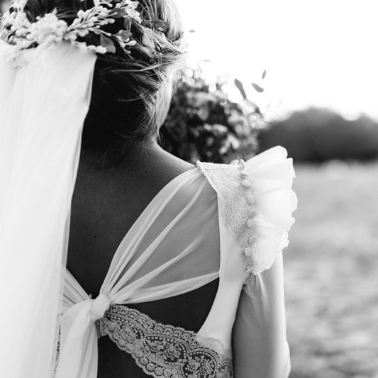 Stylish Wedding Dress with beautiful Back Detail from Beba’s Closet, for a Destination Wedding at Castillo de Viñuelas in Madrid, Spain | Lorena San José Photography