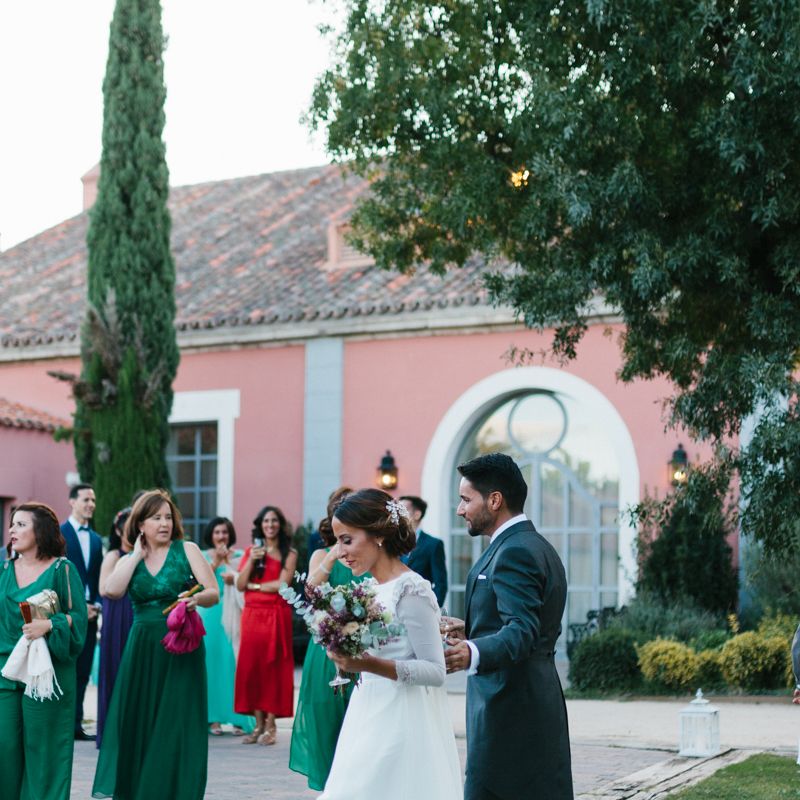 Stylish Wedding Dress with beautiful Back Detail from Beba’s Closet, for a Destination Wedding at Castillo de Viñuelas in Madrid, Spain | Lorena San José Photography
