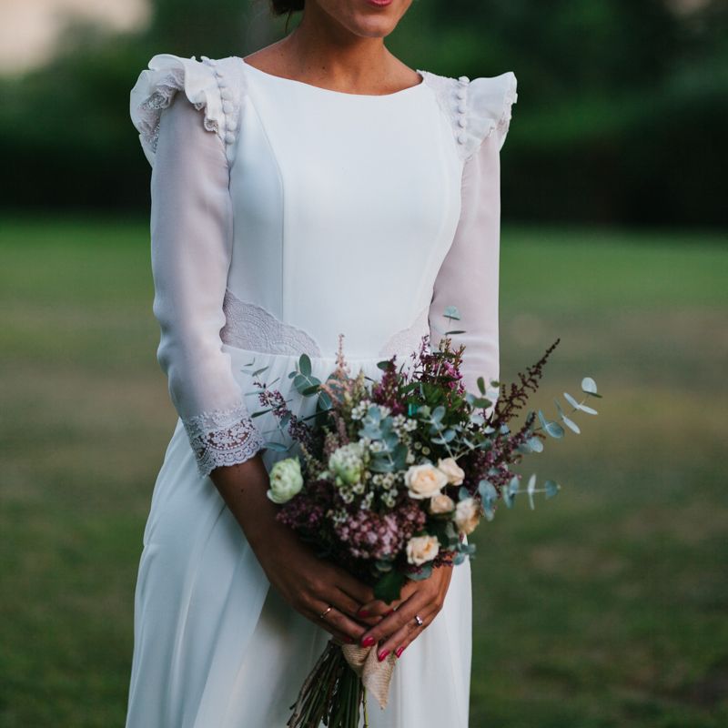 Stylish Wedding Dress with beautiful Back Detail from Beba’s Closet, for a Destination Wedding at Castillo de Viñuelas in Madrid, Spain | Lorena San José Photography