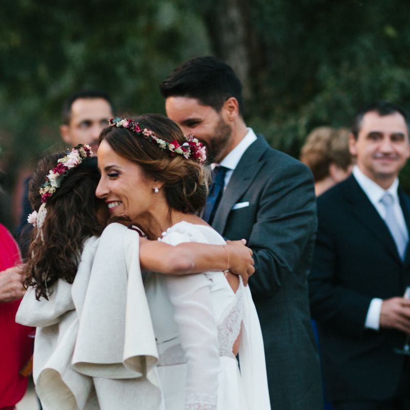 Stylish Wedding Dress with beautiful Back Detail from Beba’s Closet, for a Destination Wedding at Castillo de Viñuelas in Madrid, Spain | Lorena San José Photography
