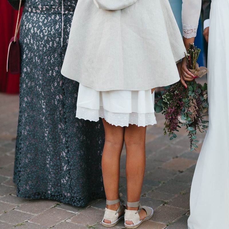 Stylish Wedding Dress with beautiful Back Detail from Beba’s Closet, for a Destination Wedding at Castillo de Viñuelas in Madrid, Spain | Lorena San José Photography