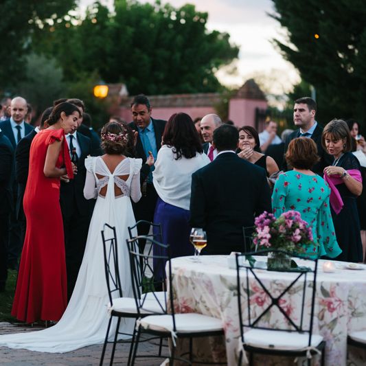 Stylish Wedding Dress with beautiful Back Detail from Beba’s Closet, for a Destination Wedding at Castillo de Viñuelas in Madrid, Spain | Lorena San José Photography