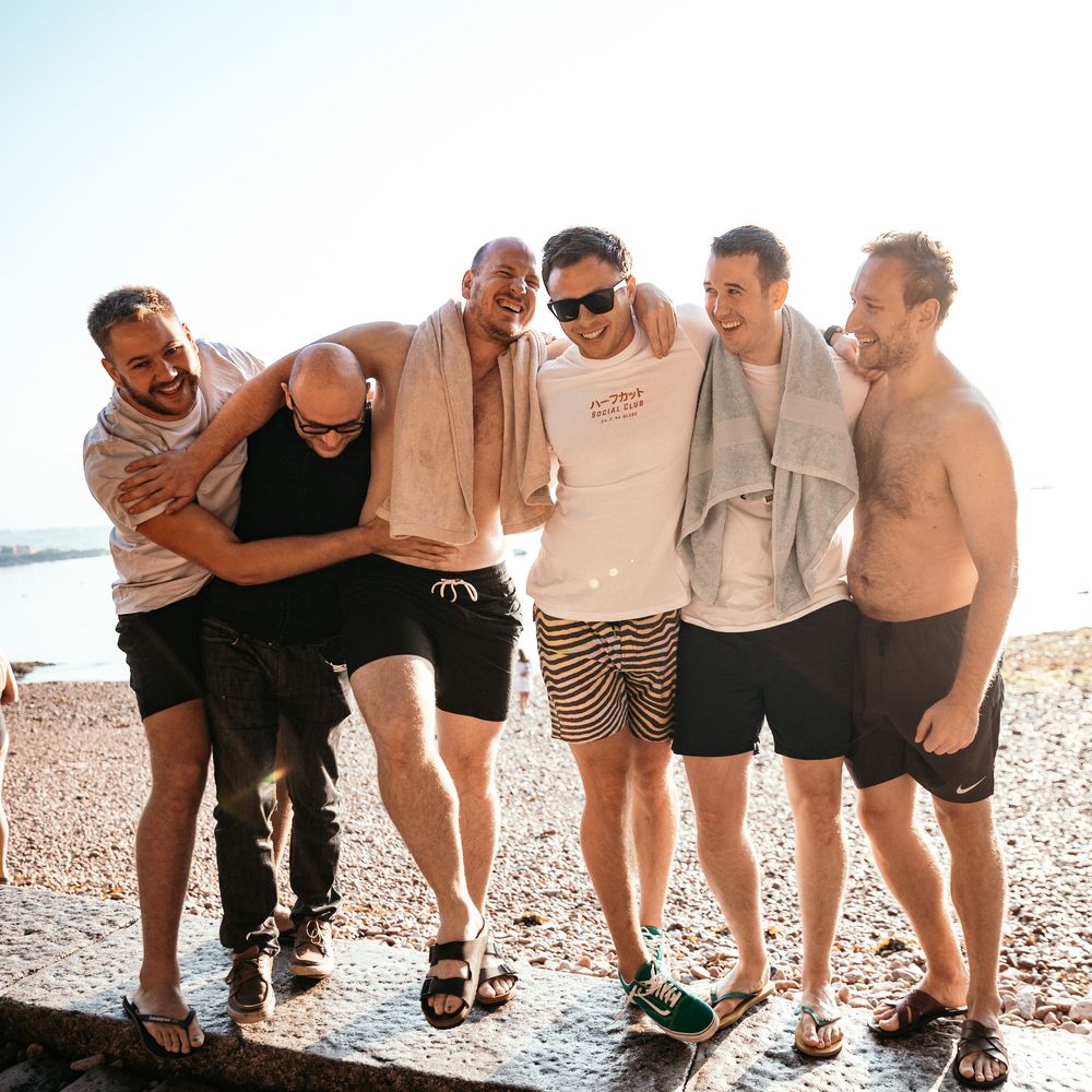 7am Morning Sea Swim On The Wedding | Marquee in Jersey | Foliage Installations | Quints of Jersey Stationery | Bride Wears Enzoani | Images by Max Burnett