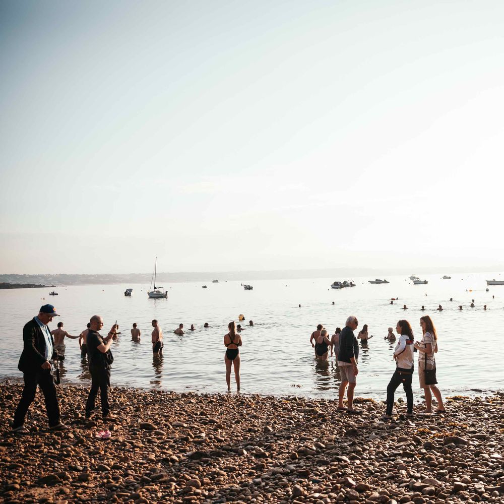 7am Morning Sea Swim On The Wedding | Marquee in Jersey | Foliage Installations | Quints of Jersey Stationery | Bride Wears Enzoani | Images by Max Burnett
