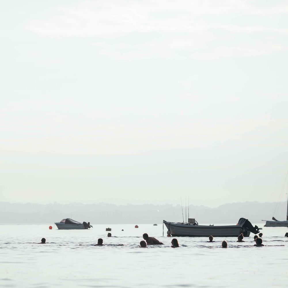 7am Morning Sea Swim On The Wedding | Marquee in Jersey | Foliage Installations | Quints of Jersey Stationery | Bride Wears Enzoani | Images by Max Burnett