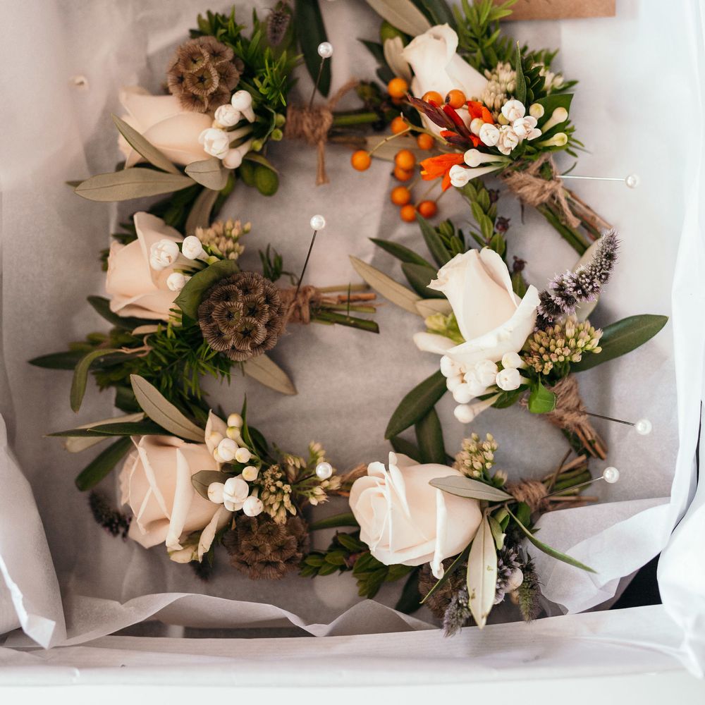 Blush Roses Buttonholes. Enchanted Forest Theme | Florals and Foliage Installations by Eden by Claire | Quints of Jersey Stationery | Bride Wears Enzoani | Images by Max Burnett